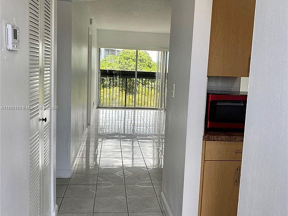 5th image of 8740 N Sherman Cir APT 403
