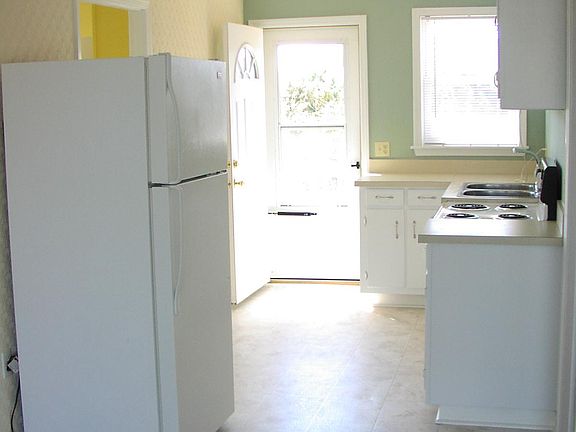 Kitchen with back door to deck.