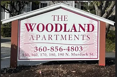 WOODLAND APARTMENTS — Photo 1
