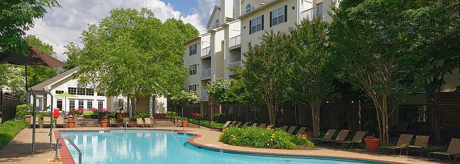 Courtyard with swimming pool and sundeck with lounge seating