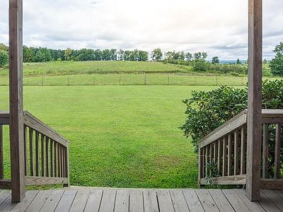 F.Porch stairs view-Lg pond