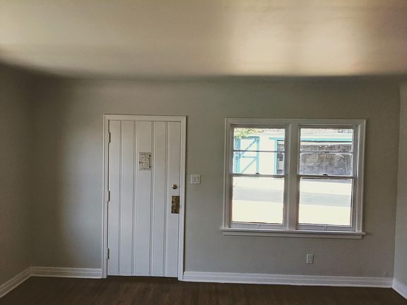 Den with hallway into bedrm and bathrm behind you