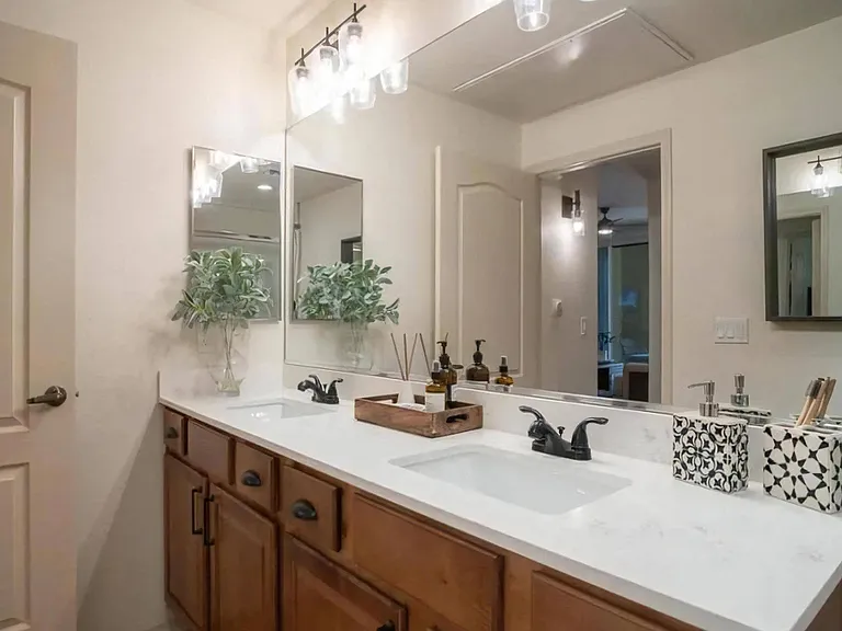 Double Bath Vanities with Undermount Sinks and Full-Size Framed Mirror