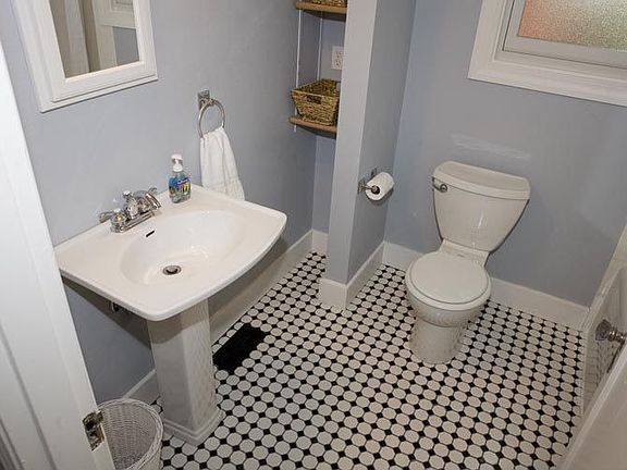Main bth w/updated pedestal sink, beautiful white millwork 