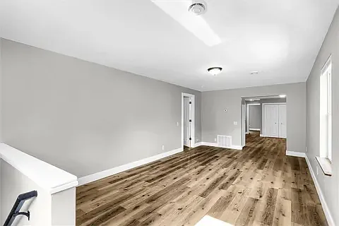 Walking up the stairs, you'll see an open space. Set your couch and TV there, kick back, chips and popcorn ready, and enjoy some movies.