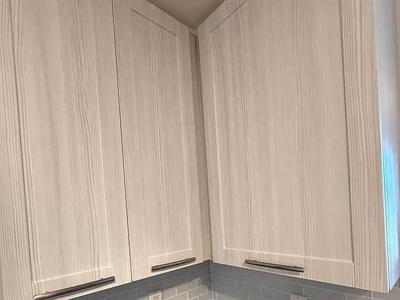 Custom Cabinetry + porcelain tilework