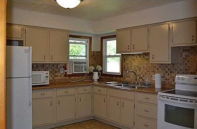 Kitchen. Large kitchen area with new Counter Tops and Back Splashes.