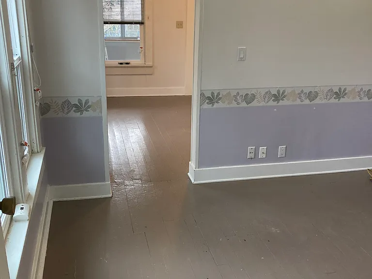 Office with doorway to living room