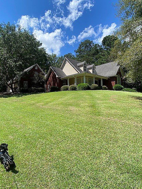 2,915 heated sqft. -5 acres