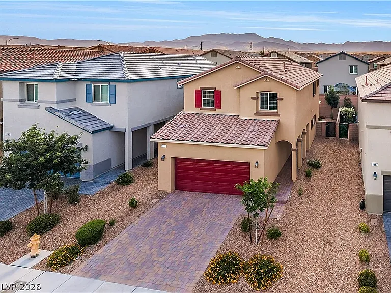Long, driveway with pavers