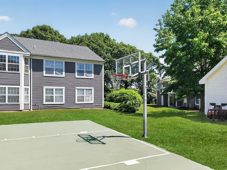Elevate your lifestyle at Summit at Mill Ridge with this inviting outdoor basketball court, perfect for friendly games or casual practice. Enjoy spacious living and a vibrant community. Schedule your visit today!