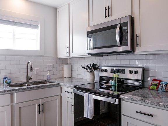 Renovated kitchen with new stainless steel appliances