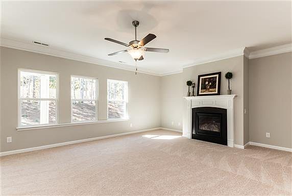 MODEL HOME PICTURE- Spacious Great Room with 9' Ceilings and Gas Fireplace!