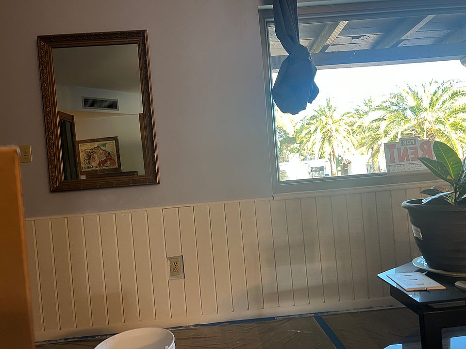 Freshly painted living room with covered front porch