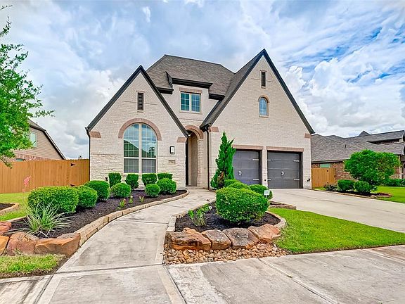 2 car attached garage and plenty of driveway space for guests.