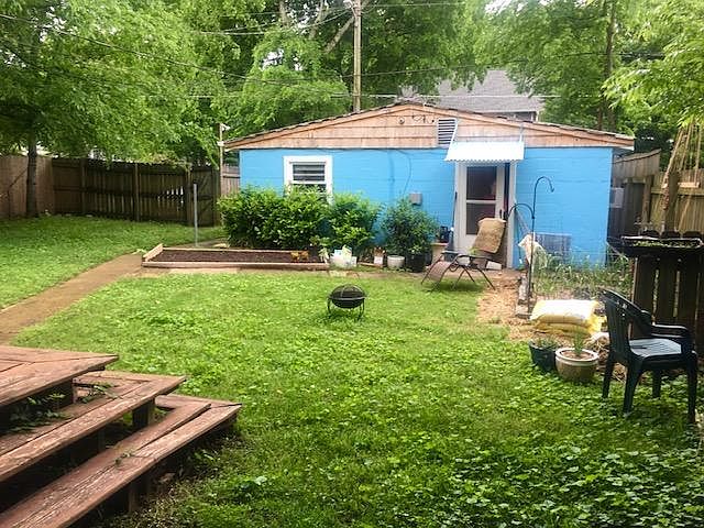 fenced yard in the middle of sylvan park