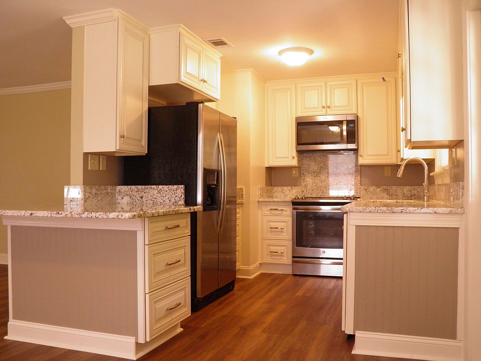 Newly Renovated Kitchen with stainless appliances, soft close drawers, granite counters.