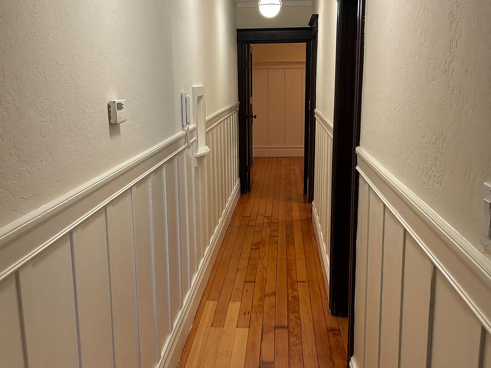 Entrance hallway, 1st bedroom wiht fireplace directly on the left in front of the unit, then second bedroom, bathroom, Living room and eat in Kitchen. Video on our site for Steele Properties
