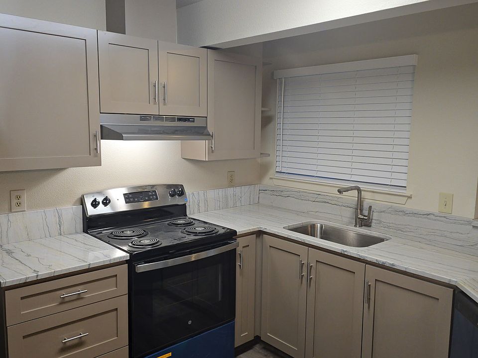 Newly remodeled kitchen with all new cabinets, countertops, appliances and fixtures