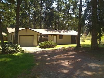 Mature trees fill this large .62 acre lot.