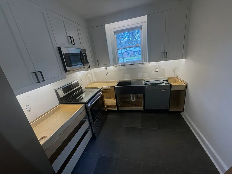 Kitchen on July 3 - drawer and cabinet fronts to be installed July 4