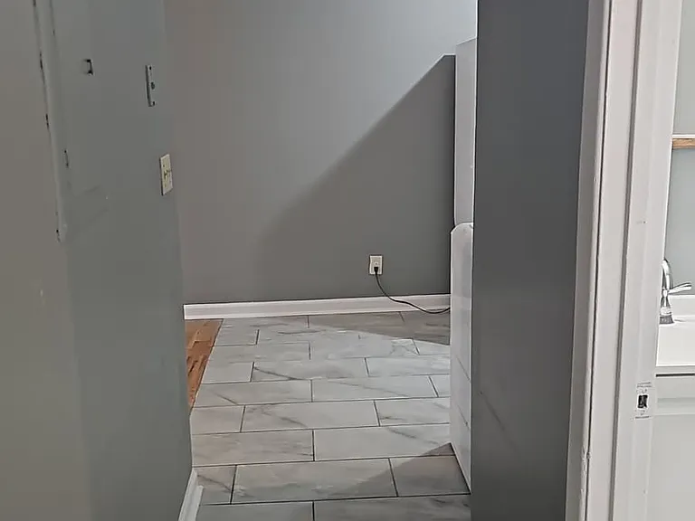Freshly painted and tiled hallway