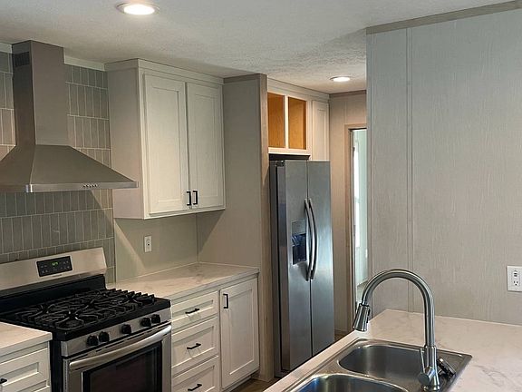 3rd image of 6621 W Ridge Rd Lot 43W
