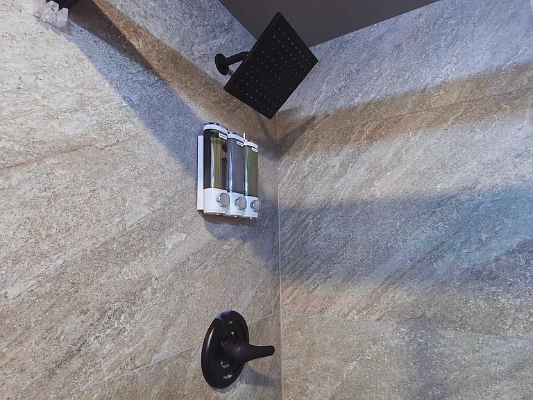 Large square showerhead with liquid soap dispenser for convenience