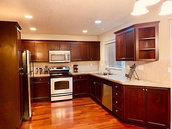 Kitchen, microwave and dishwasher.