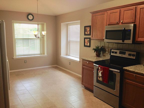 Kitchen has large walk in pantry/ laundry room. Great for keeping laundry under control and out of public sight.