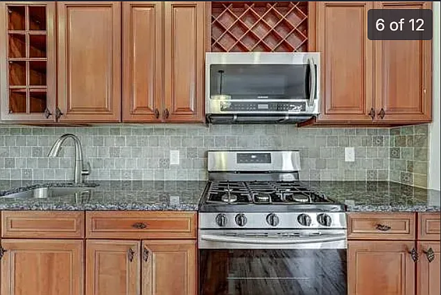 Plenty of cabinetry and modern stainless steel appliances