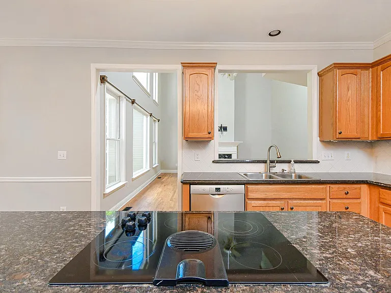 Service Window from kitchen to the Family Room