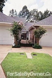 Gated Courtyard
						:
						Private back entrance.
