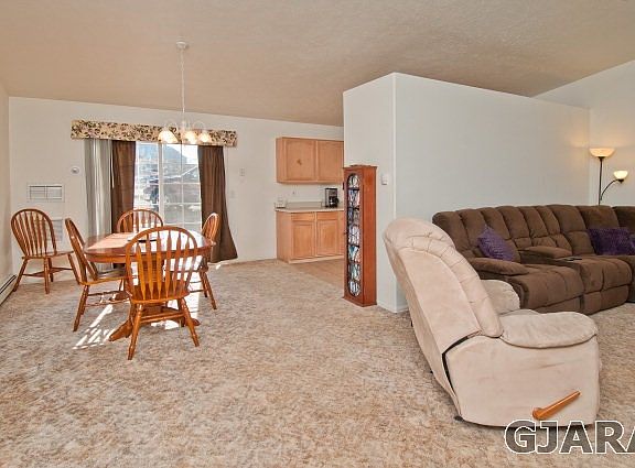 Dining Area Adjacent To Living Room