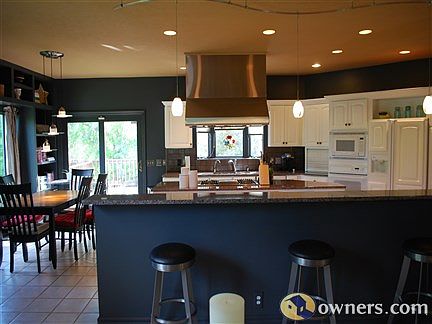 Open Kitchen w/ long breakfast bar with 2nd sink