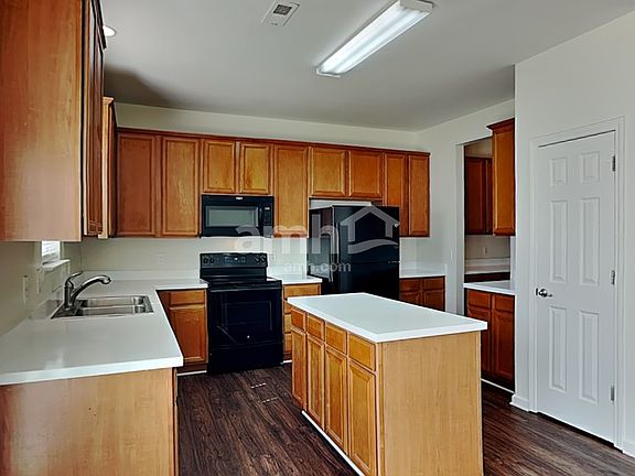 4th image of 8507 Four Sisters Ln