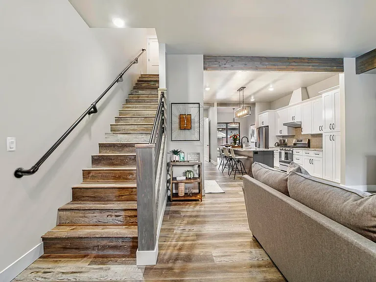 Living Room With Stairway to Bedrooms Upstairs