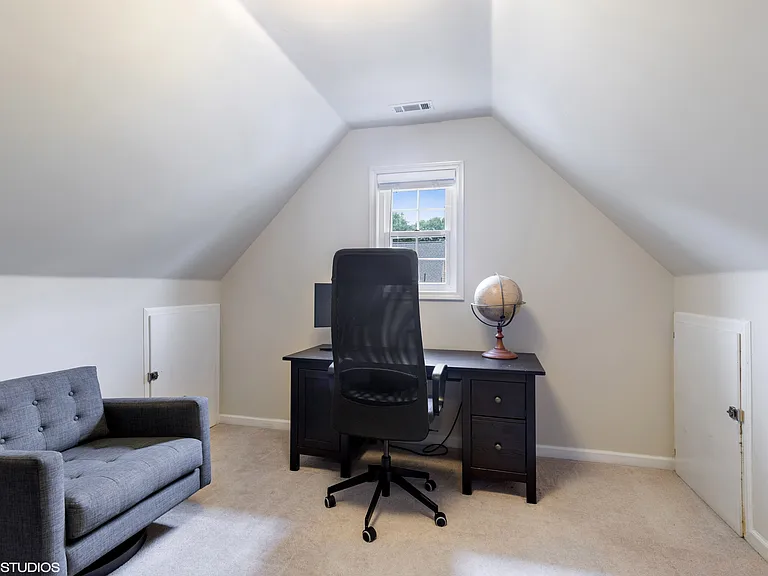 Note, since this picture was taken, the upstairs carpeting was replaced with solid white oak hardwood floors.