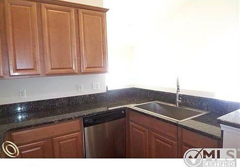 KITCHEN W GRANITE COUNTERS.