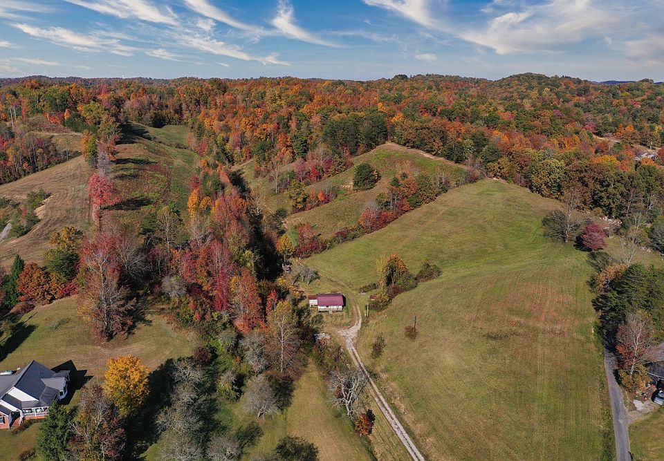 Beautiful aerial drone shot from the south boundary of the property at the entrance looking north