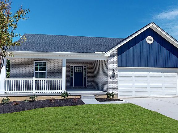 This Savannah Has Brick in Alpine Select and Vertical Board and Batton Siding in Riviera Dusk