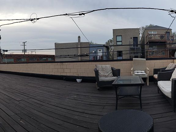 Backyard UPPER deck. There is also a lower deck.