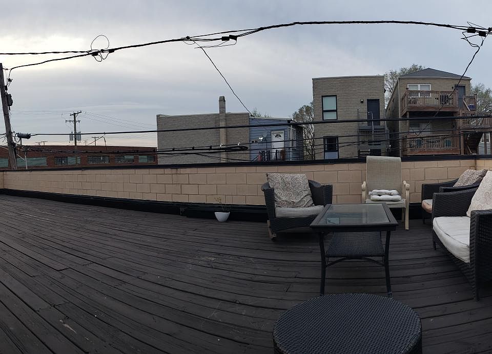 Backyard UPPER deck. There is also a lower deck.