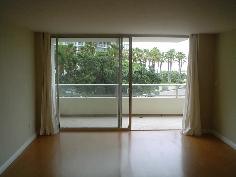 View from kitchen to living area and private terrace.
