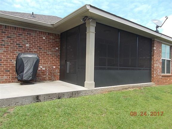 13X8 SCREENED PORCH AND 13X8 PATIO LOCATED ON THE SIDE OF THE HOUSE.  TOP OF THE LINE GAS GRILL REMAINS WITH THE PROPERTY