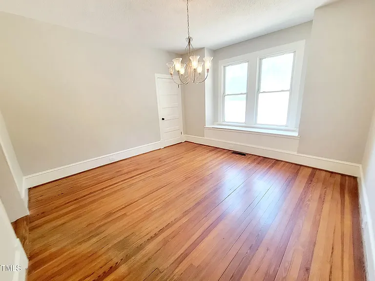 Formal dining room with pantry and bay windows