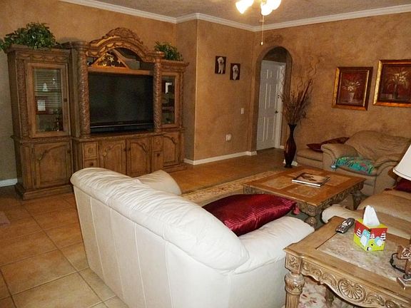 There's a very open feel to this space since the den and kitchen are open to each other.