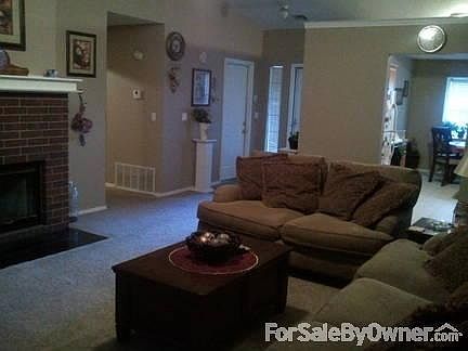 Southeast view of Living Room
						:
						Big open living room with fireplace make this room a great place to sit & relax.