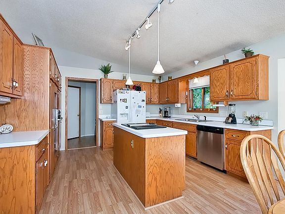 New flooring in kitchen, dining & entry