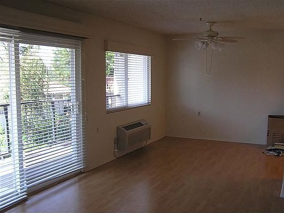 Dining room with ceiling fan and view!!